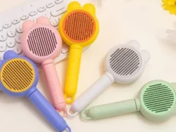 Cepillo Autolimpiante para Mascotas con Boton Y Orejitas