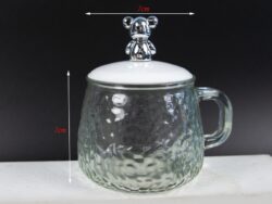 Taza De Vidrio Con Tapa Y Figura De Oso Cromado NEXT MB-1331